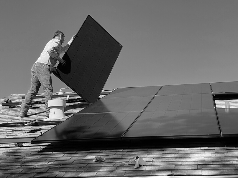 Man Installing Solar Panels 